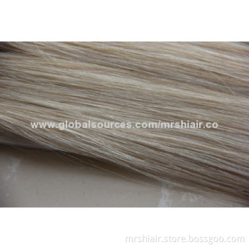 24-inch pale color Malaysian straight tape in hair